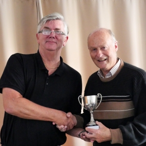 Jerry Guest (Chester)  receiving the B Level Adv AC league trophy from Fed Chairman Paul Rigge