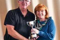 Vi Richards (Bury)  receiving the Short AC league trophy from Fed Chairman Paul Rigge