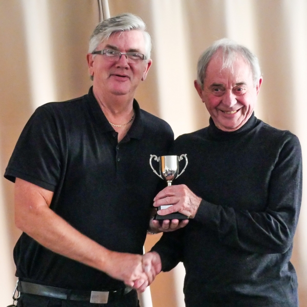 Alan Clare (Chester Centurions) receiving the LPGC league trophy from Fed Chairman Paul Rigge