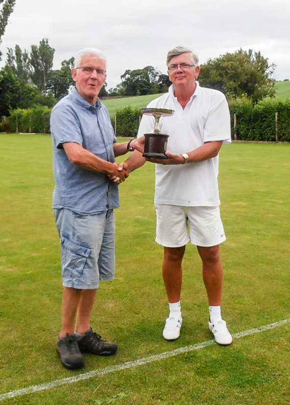 Andrew Webb (Pendle) presents Paul Rigge with the 2019 Lancashire Open Golf Trophy.