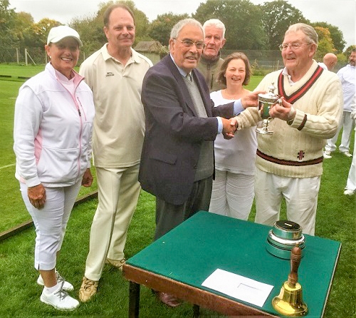 CA President, Quiller Barratt, presents the Longman Cup to Pendle captain Robin Delves.  Also in picture: l to r - Libby Dixon; Paul Dowdall, Catherine Parnell.