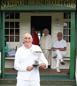 Peter MacDermott with the 2010 Southport B Level Trophy