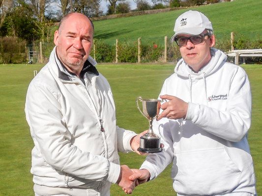 Tournament Manager, James Hawkins presents the B Level trophy to Andy Brandwood (Bury)