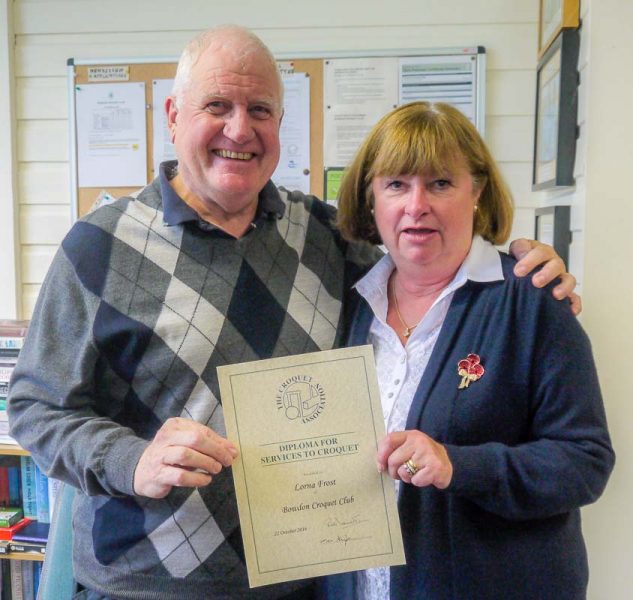 Lorna Frost receiving her CA Diploma for services too Croquet, from Brian Storey, Secretary of Bowdon CC.