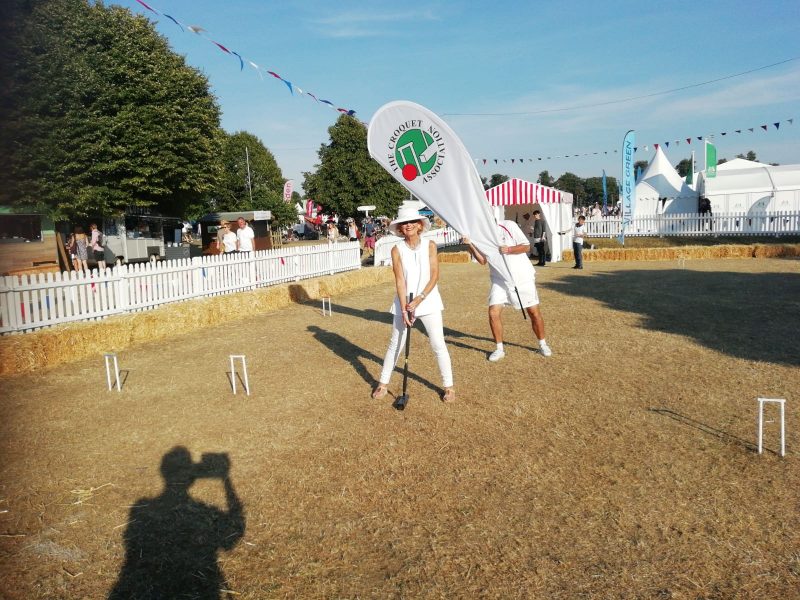 Tim King keeps Sandy Finchett-Maddock cool in the sun.