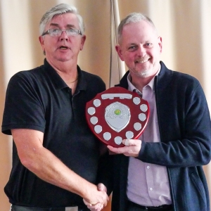 David Cornes (Crake) receiving the HGC league trophy from Fed Chairman Paul Rigge