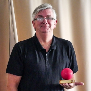 Fed Chairman Paul Rigge with the m/w Hcp AC league trophy awaiting to present it to a Pendle representative.